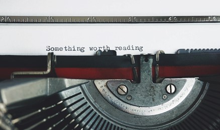 something worth reading words typed on a vintage typewriter